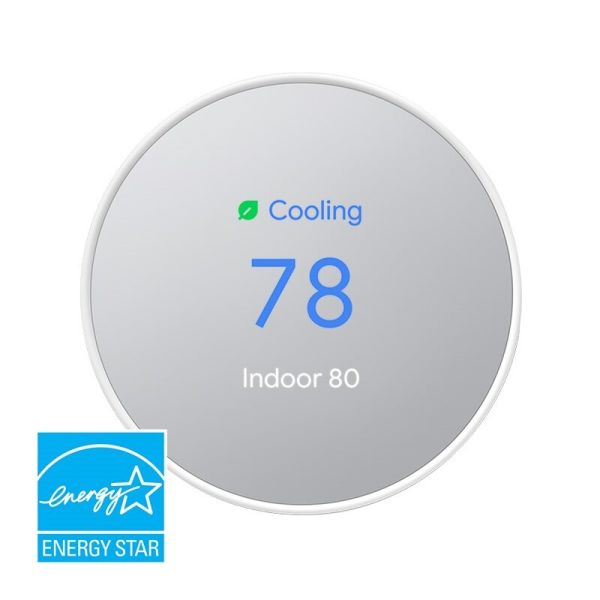 Google Nest Smart Thermostat in snow white, featuring a minimalist design and a circular touchscreen interface for intuitive temperature adjustments.